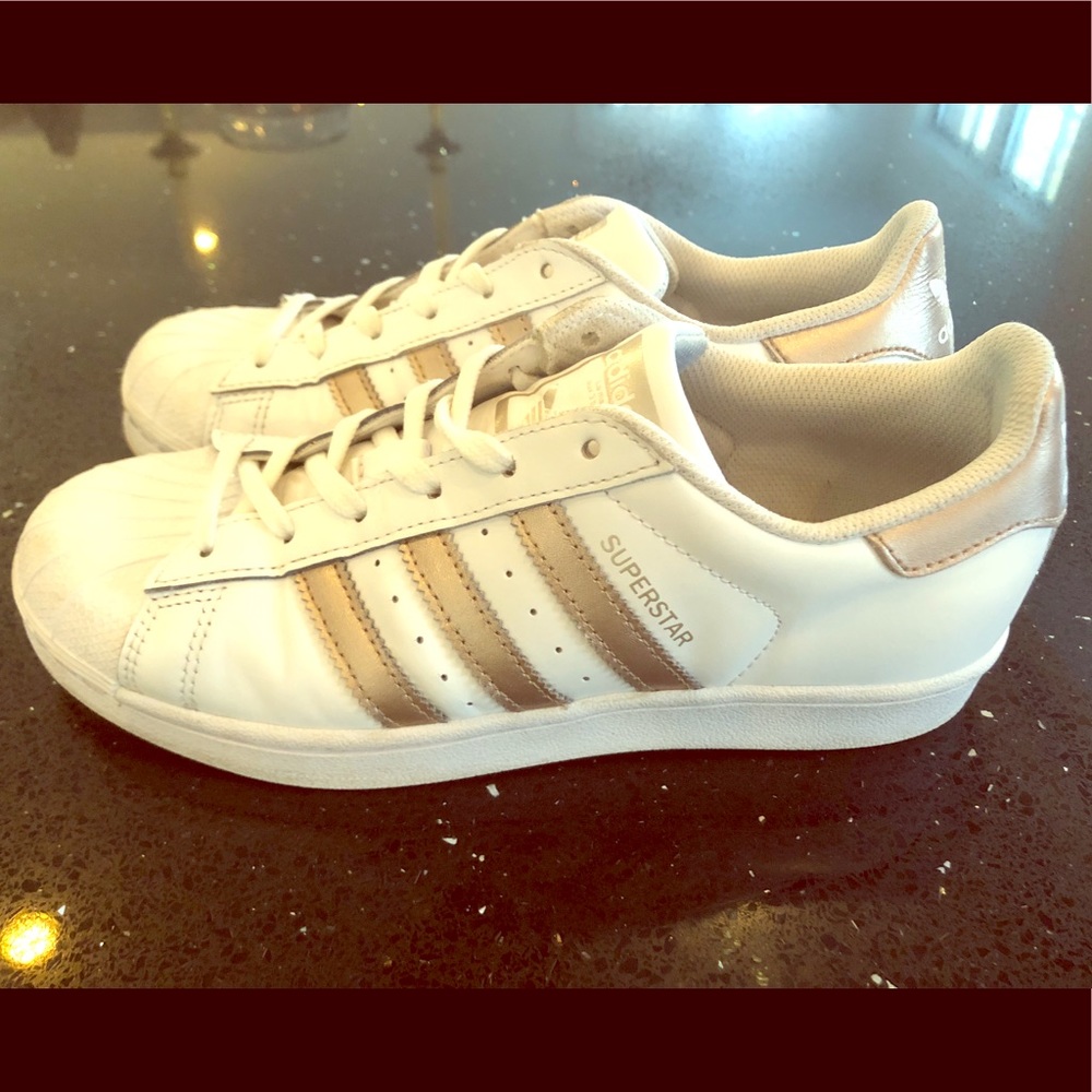 Women’s adidas white and rose gold sneakers